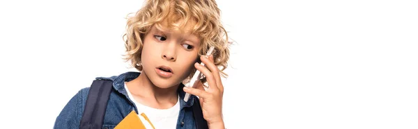 Panoramic Crop Curious Schoolboy Holding Book Talking Smartphone Isolated White — Stock Photo, Image