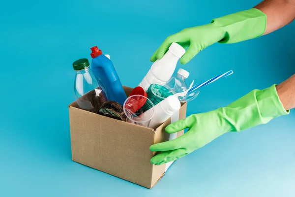 Cropped View Cleaner Rubber Gloves Collecting Rubbish Cardboard Box Blue — Stock Photo, Image