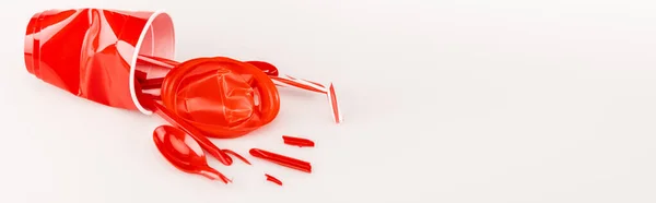 Broken Red Plastic Objects White Background Panoramic Shot — Stock Photo, Image