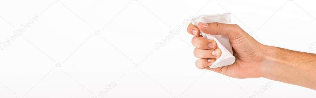 cropped view of man crumpling disposable cup isolated on white, panoramic shot