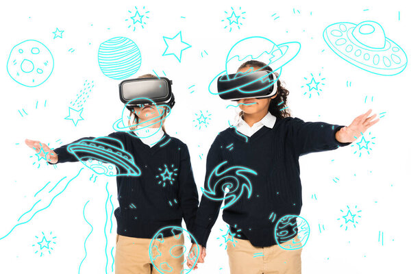 multicultural schoolgirls holding hands while using virtual reality headsets isolated on white, space illustration
