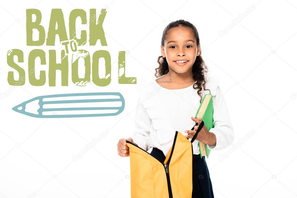 african american schoolgirl holding backpack and book isolated on white, back to school illustration