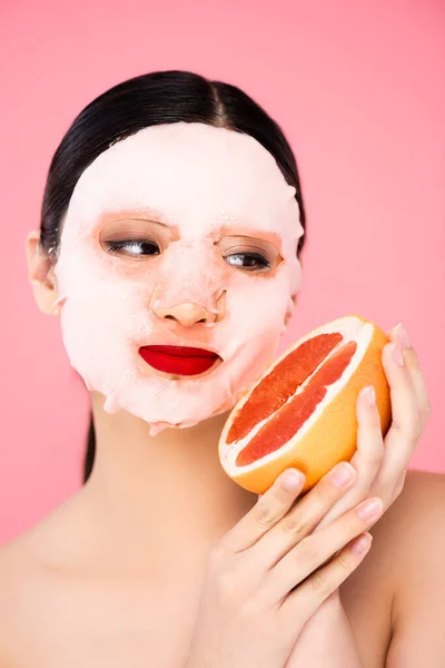 Brunette Asian Woman Face Mask Holding Half Juicy Grapefruit Isolated — Stock Photo, Image