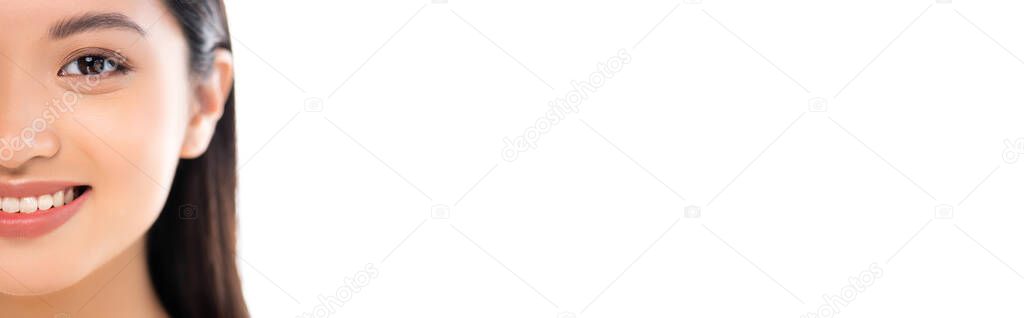 Panoramic shot of excited young asian woman looking at camera isolated on white