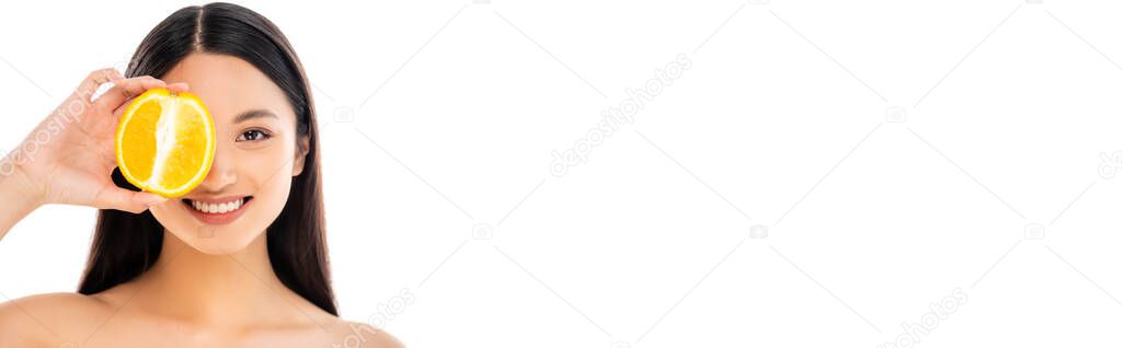 website header of asian woman covering eye with half of orange isolated on white
