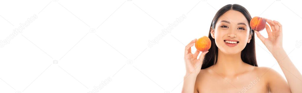 website header of naked asian woman holding whole ripe peaches isolated on white