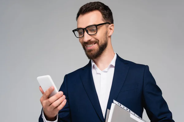 Young Businessman Blue Blazer Eyeglasses Looking Mobile Phone Isolated Grey — Stock Photo, Image