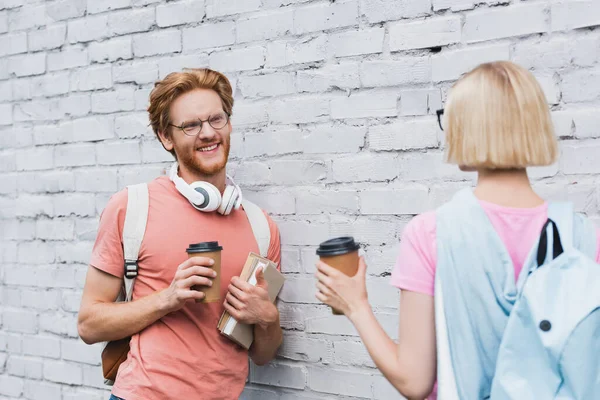 Selective Focus Bearded Student Looking Blonde Friend While Holding Coffee — Stock Photo, Image