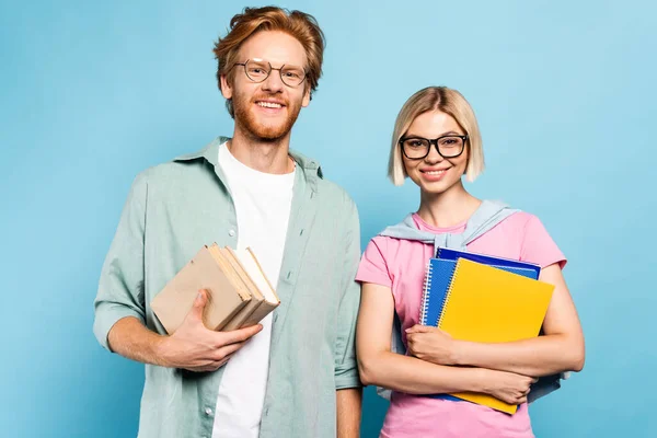 Young Students Glasses Holding Notebooks Books While Standing Blue — Stock Photo, Image