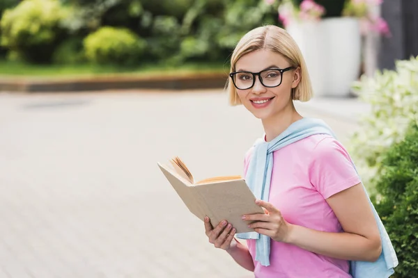 Young Blonde Student Glasses Holding Book — Stock Photo, Image