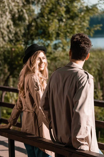 Blonde Woman Hat Looking Boyfriend Trench Coat — Stock Photo, Image