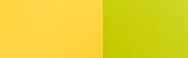 вид сверху на красочный абстрактный желтый и зеленый бумажный фон, панорамный снимок