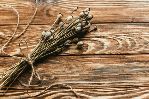 Top view of dry poppies on wooden background — Stock Image Top View Dry Poppies Wooden Background Stock Image