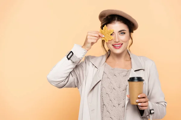 Joyful Woman Stylish Autumn Outfit Holding Coffee Covering Eye Yellow — Stock Photo, Image