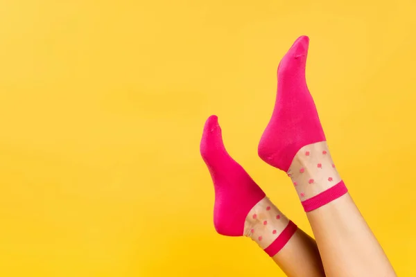 Cropped View Female Legs Pink Socks Isolated Yellow — Stock Photo, Image