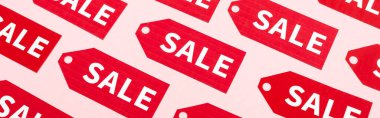Pembe, siyah cuma konsepti üzerinde satış harfleri olan etiketlerin web sitesi başlığı