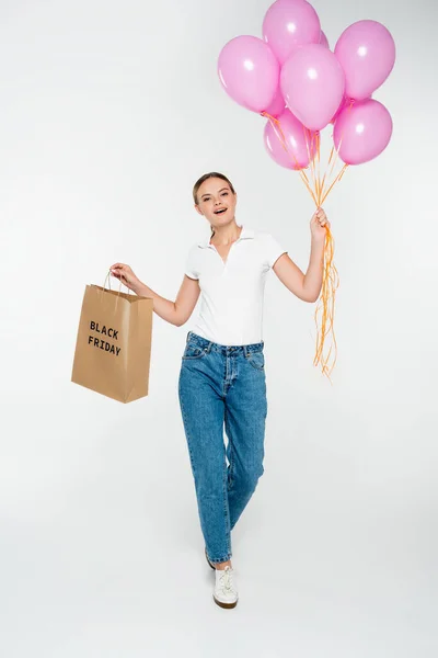 Joyful Woman Holding Shopping Bag Black Friday Lettering Pink Balloons — Stock Photo, Image