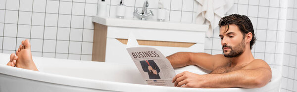 Bearded man reading business newspaper while taking bath, banner 