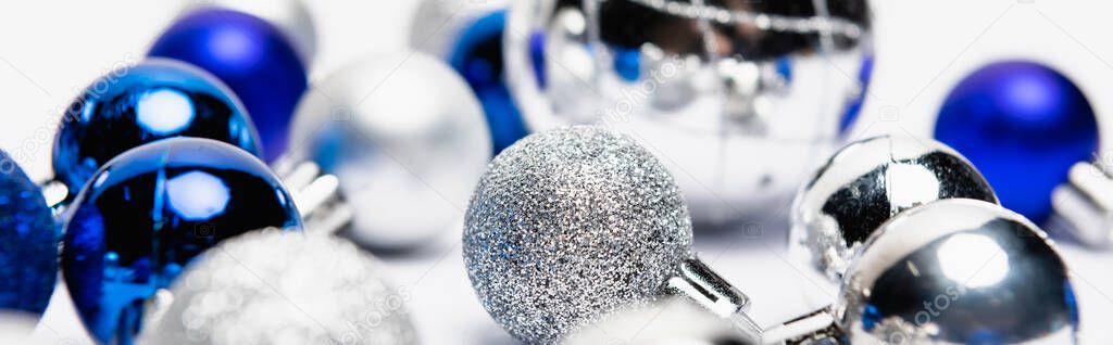 blue, silver Christmas decoration on white background, banner