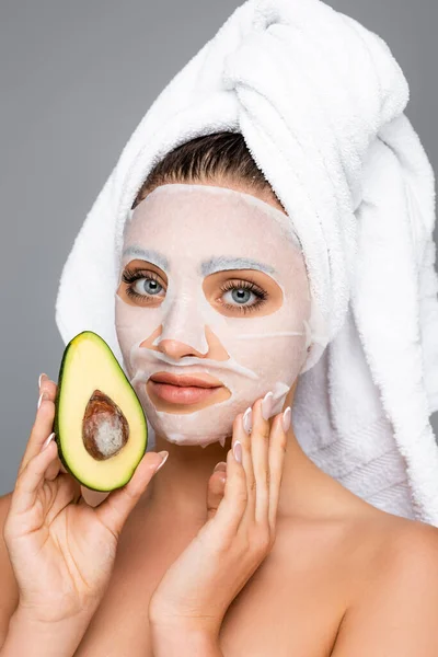 Woman Towel Head Mask Sheet Face Holding Avocado Isolated Grey — Stock Photo, Image