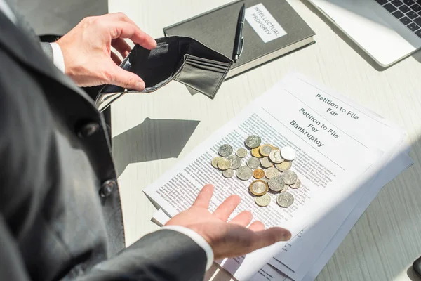 Cropped View Businessman Holding Empty Wallet Coins Petitions Bankruptcy Blurred — Stock Photo, Image