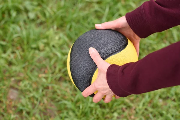 Partial view of  training with medicine ball — Stock Photo