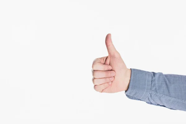 Recortado disparo de hombre mostrando el pulgar hacia arriba gesto aislado n blanco - foto de stock