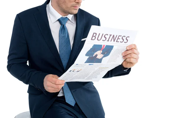 Cropped shot of businessman in formal wear reading newspaper isolated on white — Stock Photo