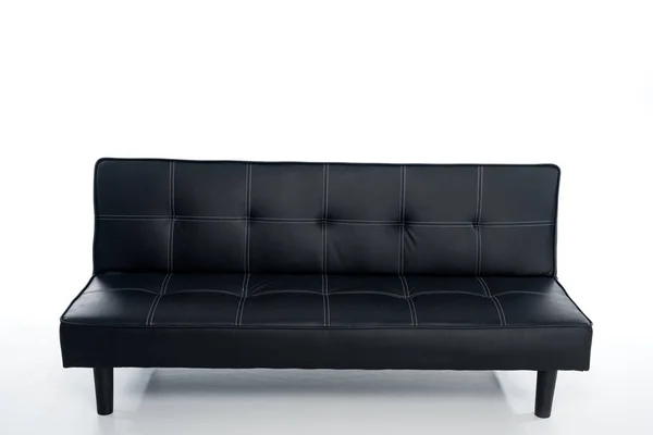 Acogedor sofá negro vacío en blanco — Stock Photo