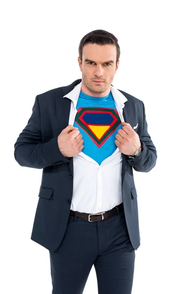Businessman showing superhero costume under suit and looking at camera isolated on white — Stock Photo