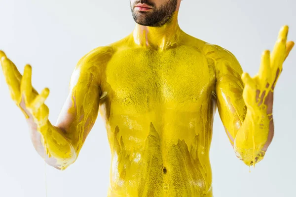 Corpo maschile e mani macchiate di liquido giallo isolato su sfondo bianco — Foto stock