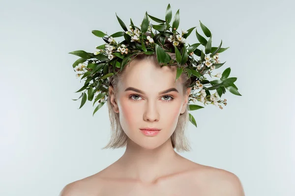 Naked blonde girl in floral wreath, isolated on grey — Stock Photo