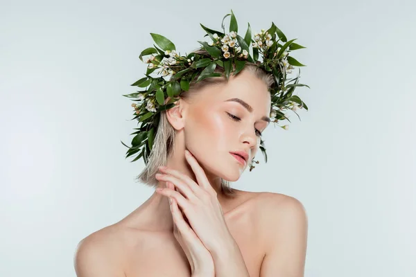 Naked tender girl in floral wreath, isolated on grey — Stock Photo