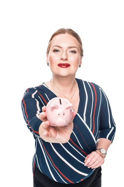 Happy female accountant giving pink piggy bank isolated on white background — Stock Photo