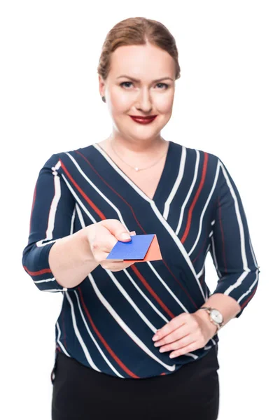 Smiling businesswoman giving red and yellow business cards isolated on white background — Stock Photo