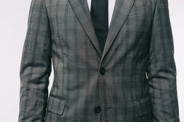 Обрізане зображення бізнесмена, що стоїть в куртці ізольовано на білому — стокове фото