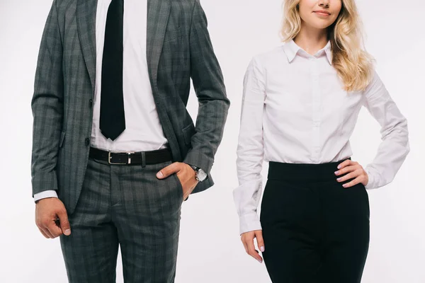 Imagem cortada de empresários de pé com as mãos akimbo isolado no branco — Fotografia de Stock