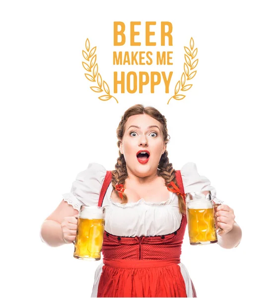 Shocked oktoberfest waitress in traditional bavarian dress with mugs of light beer isolated on white background with 