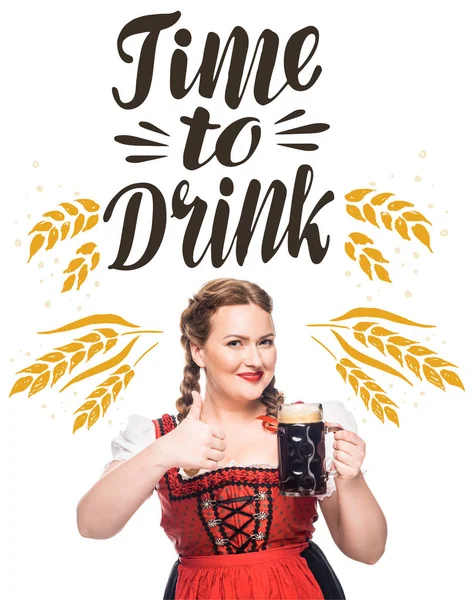 Oktoberfest waitress in traditional bavarian dress with mug of light beer and wheat isolated on white background with 