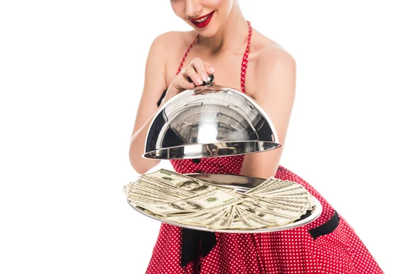 Cropped shot of pin up woman with dollar banknotes on serving tray isolated on white — Stock Photo