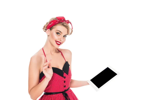Stylish woman in pin up clothing holding digital tablet with blank screen isolated on white — Stock Photo