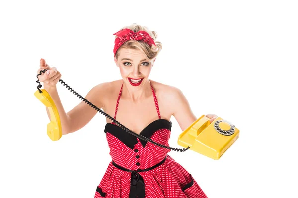 Hochwinkelaufnahme der aufgeregten Frau im Pin-up-Kleid mit Retro-Telefon isoliert auf weiß — Stockfoto