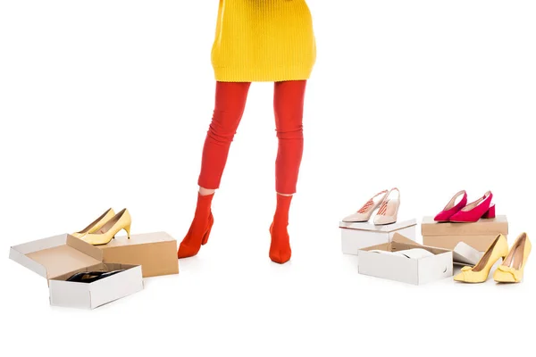 Cropped view of shopaholic isolated on white with footwear boxes — Stock Photo