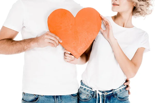 Partial view of attractive couple holding signs love isolated on white — Stock Photo