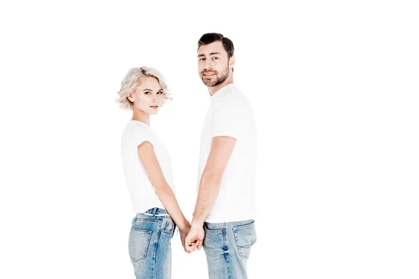 Счастливая пара держась за руки изолированы на белом — стоковое фото