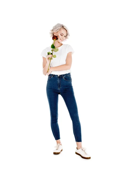 Fantastic young adult woman with red flower isolated on white — Stock Photo