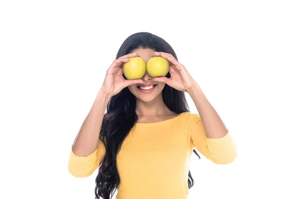 Happy young african american woman holding fresh apples isolated on white — Stock Photo