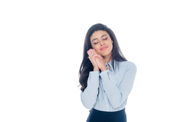 Feliz joven afroamericana mujer sonriendo con los ojos cerrados aislados en blanco - foto de stock