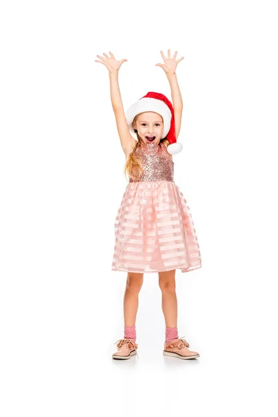 Entzückendes kleines Kind mit Weihnachtsmann hebt die Hände und feiert isoliert auf weiß — Stockfoto