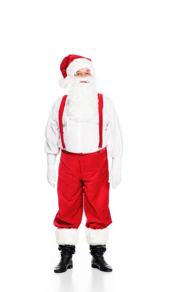 Portrait pleine longueur de Père Noël claus dans les bretelles regardant la caméra isolée sur blanc — Photo de stock